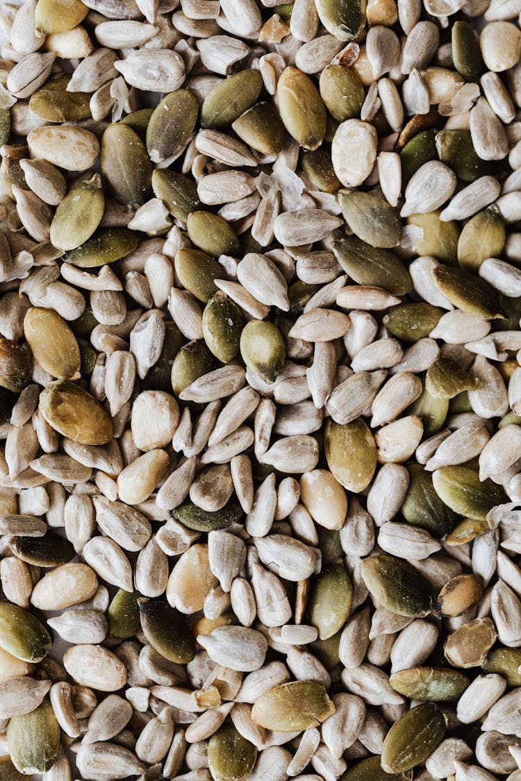 Abundance Of Pumpkin Seeds With Green And Gray Shell