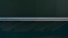 Suspension bridge over river in daytime