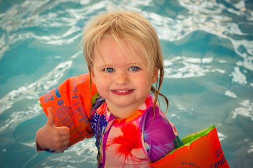 Free stock photo of indoor pool, learner swimmer, portrait Stock Photo