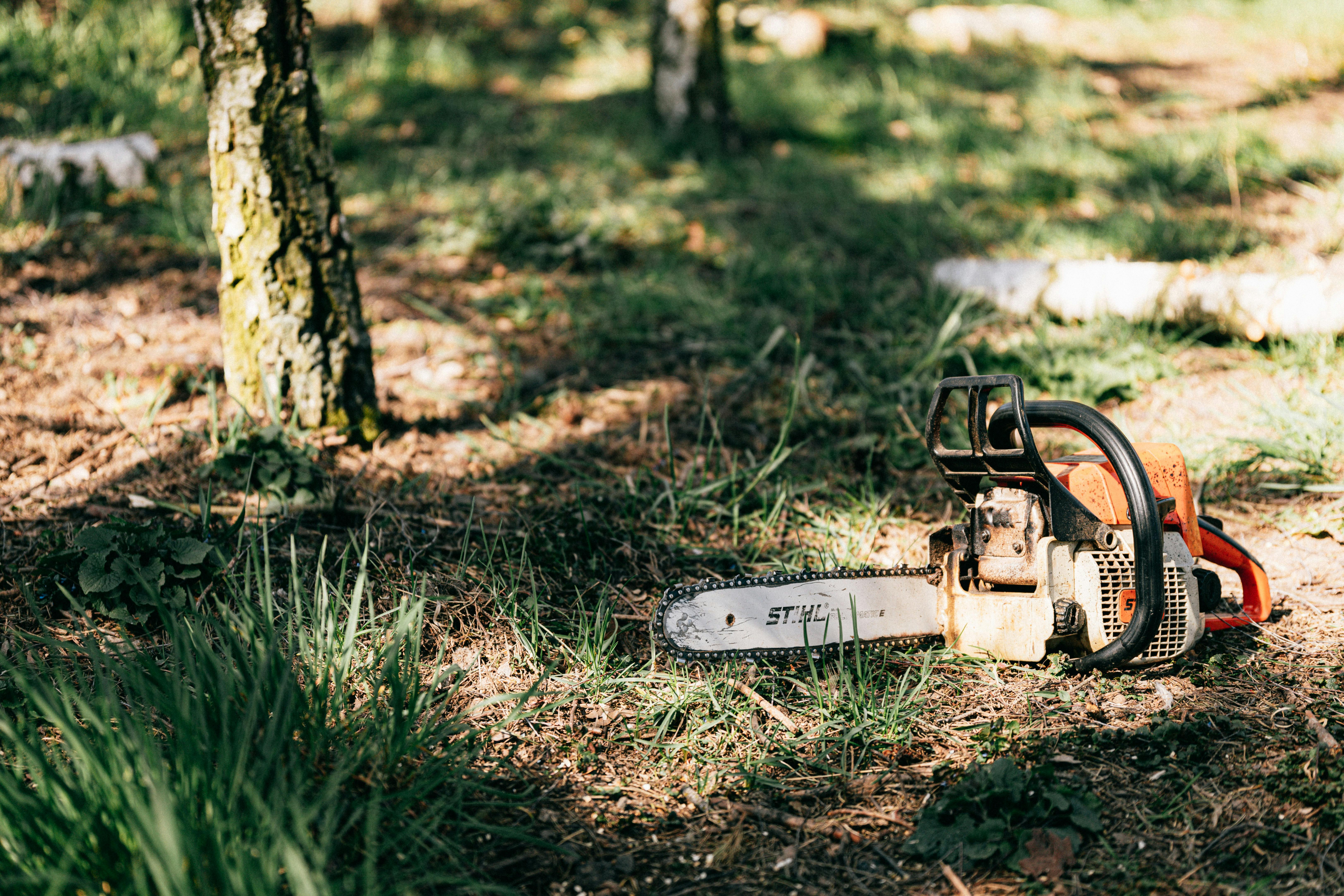 Photo of Chainsaw on Ground \u00b7 Free Stock Photo