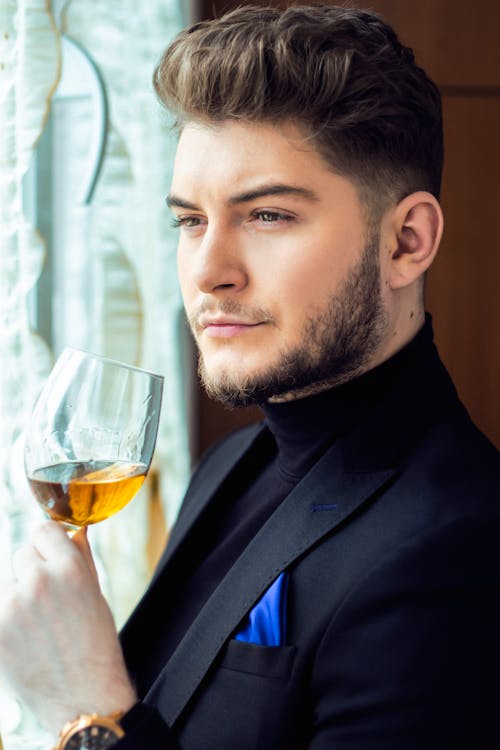 Content man with glass of wine