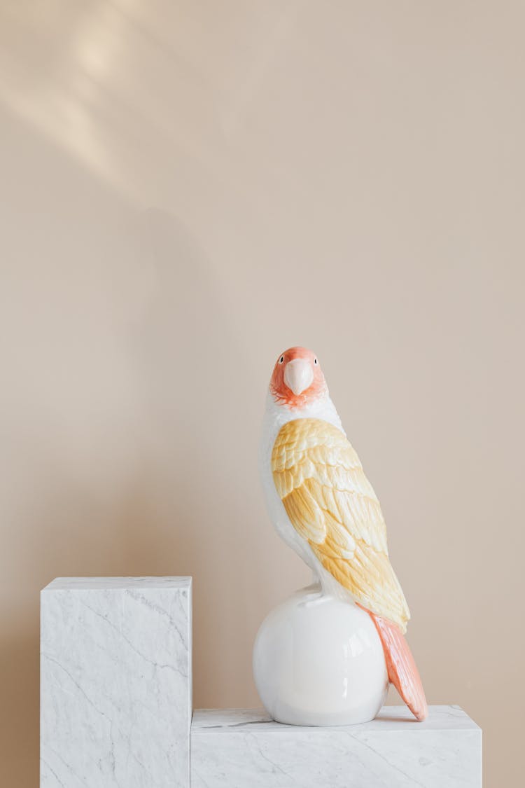 Statuette In Shape Of Parrot On Marble Stand