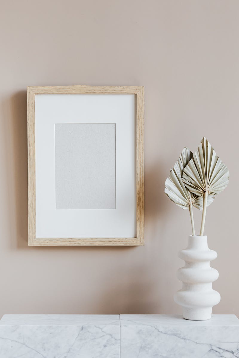 Scandinavian room interior with mockup photo frame and vase