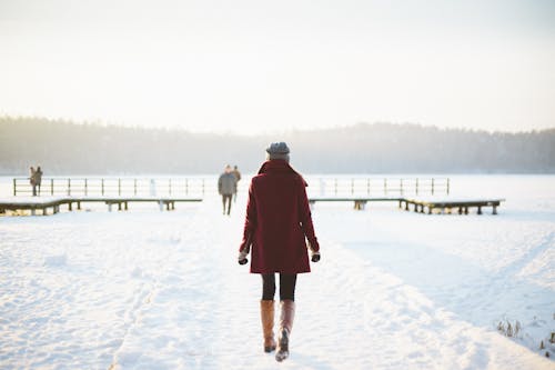 Woman Wearing Maroon Coat