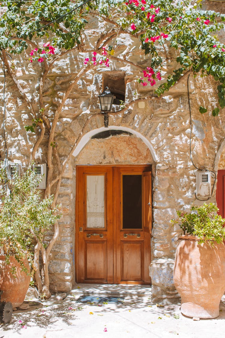 Wooden Door On A Stone House