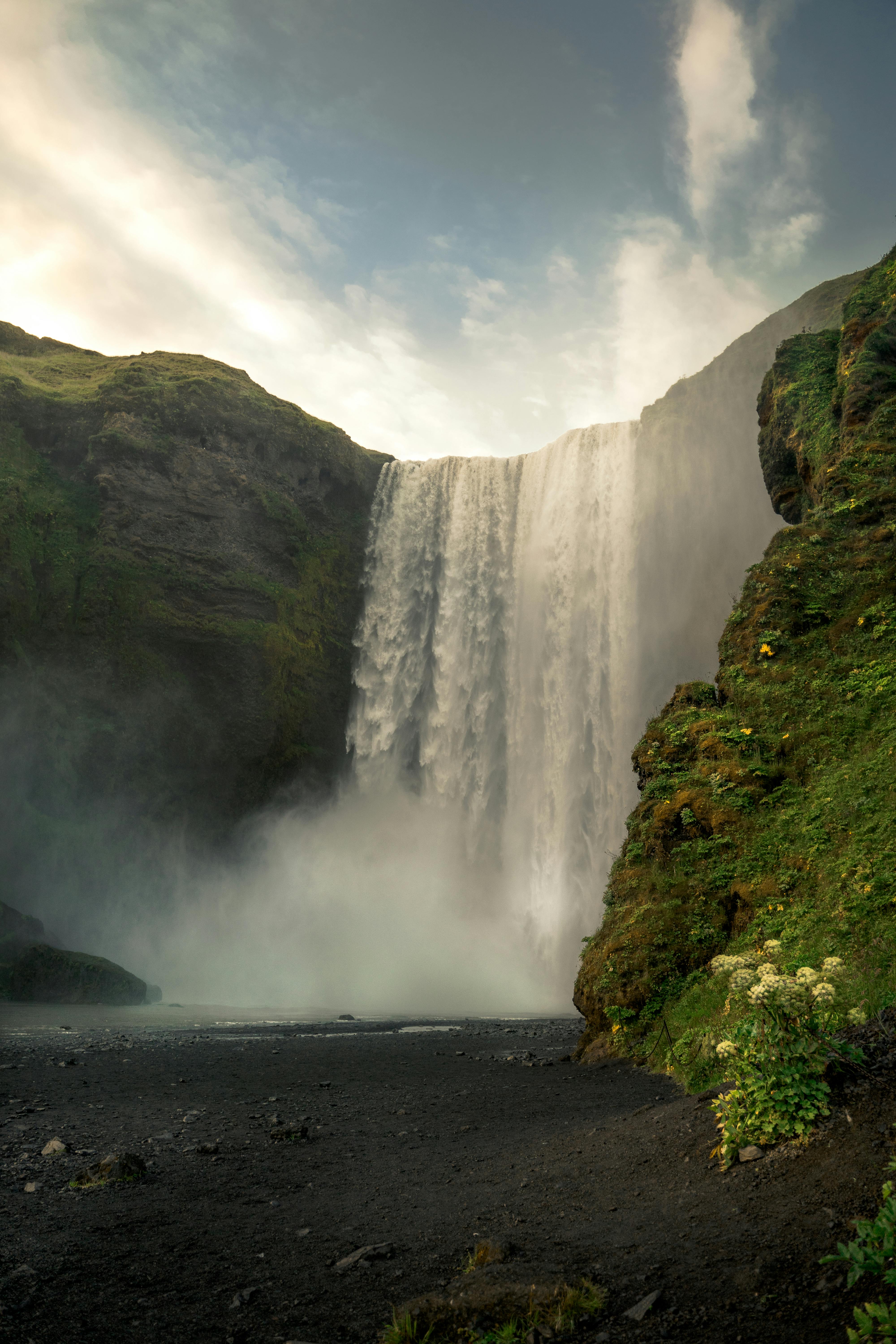 Tall waterfall of mountain river · Free Stock Photo