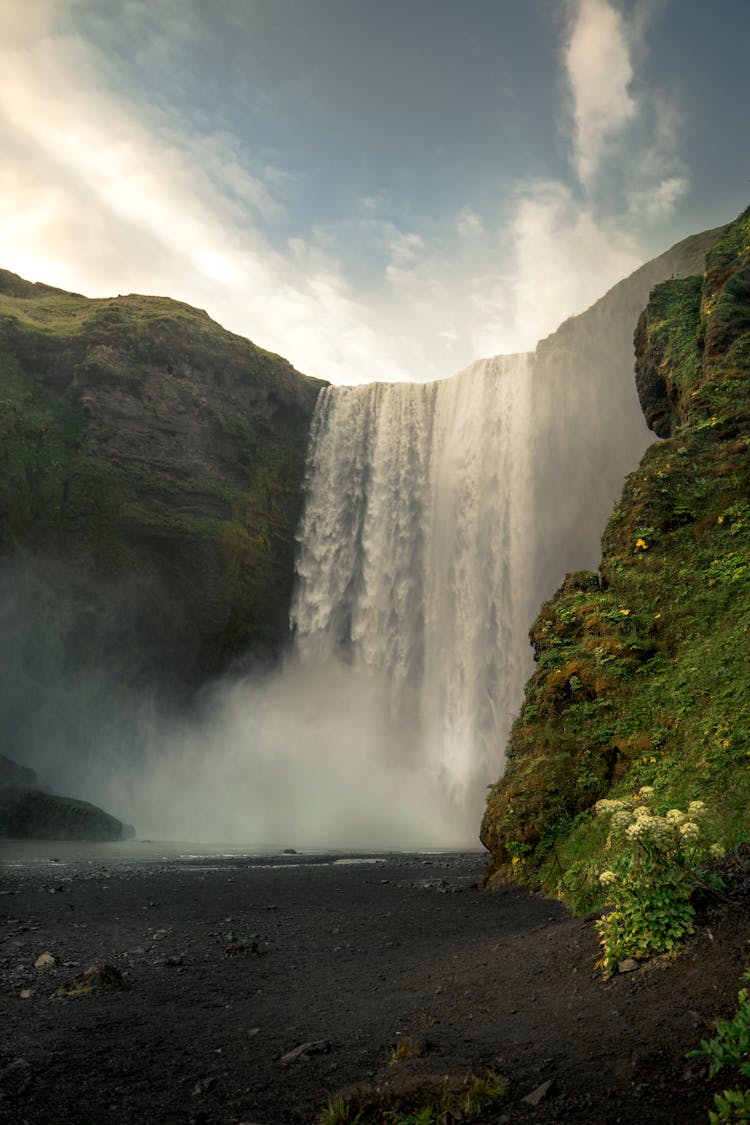 Tall Waterfall Of Mountain River