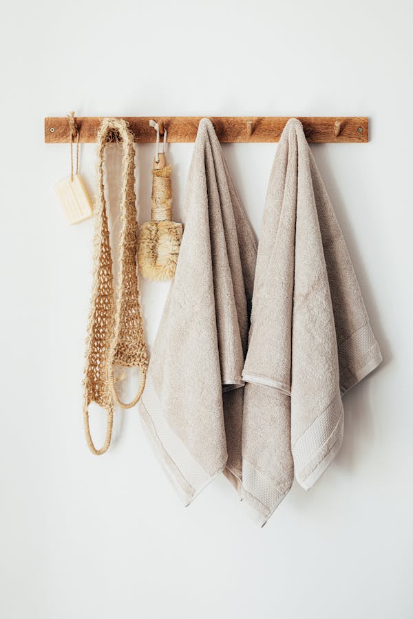 Set of body care tools with towels on hanger