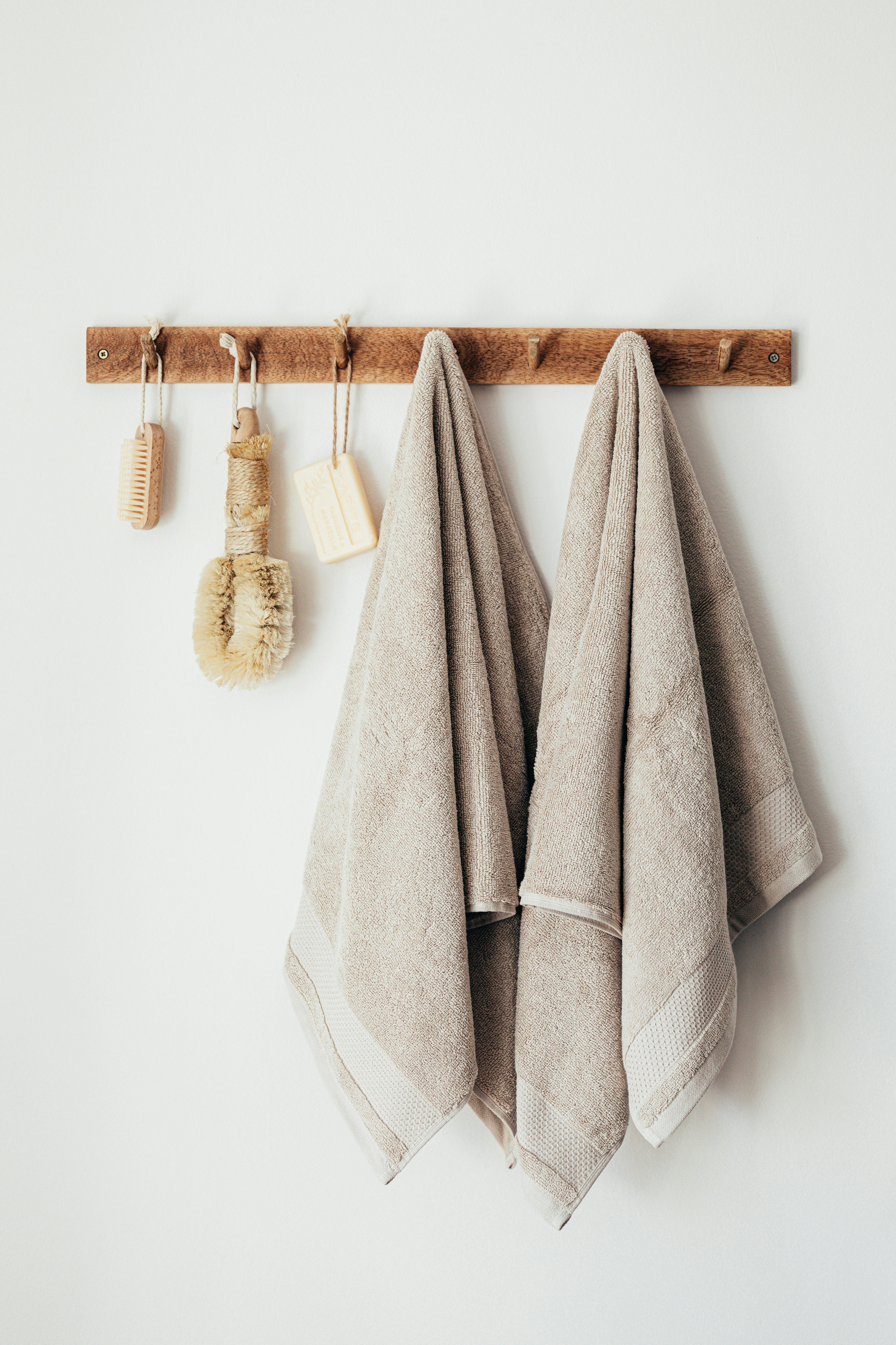 Collection of Natural Muslin Kitchen Towels are Hung in a Row on an Unusual  Wooden Hanger. Natural, Soft, Airy and Stock Image - Image of material,  fiber: 215370293