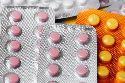 Free Close-up Photo of Pills on Blister Packs Stock Photo
