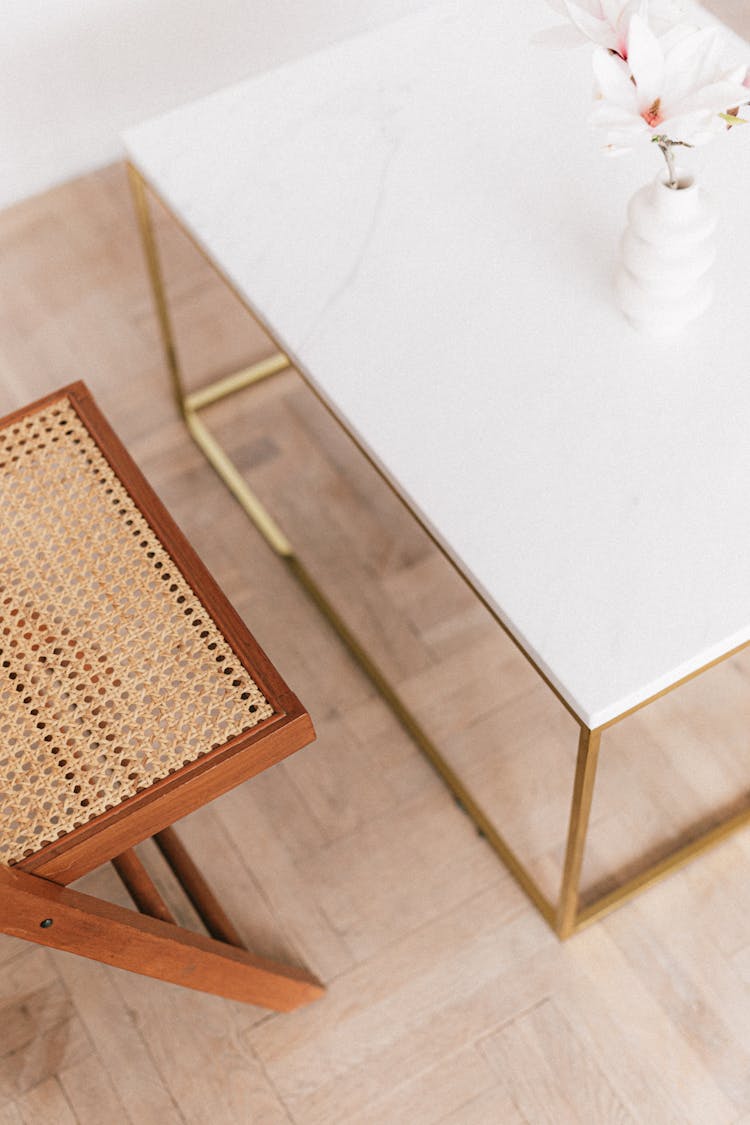 Wooden Chair And Table With Vase And Flower