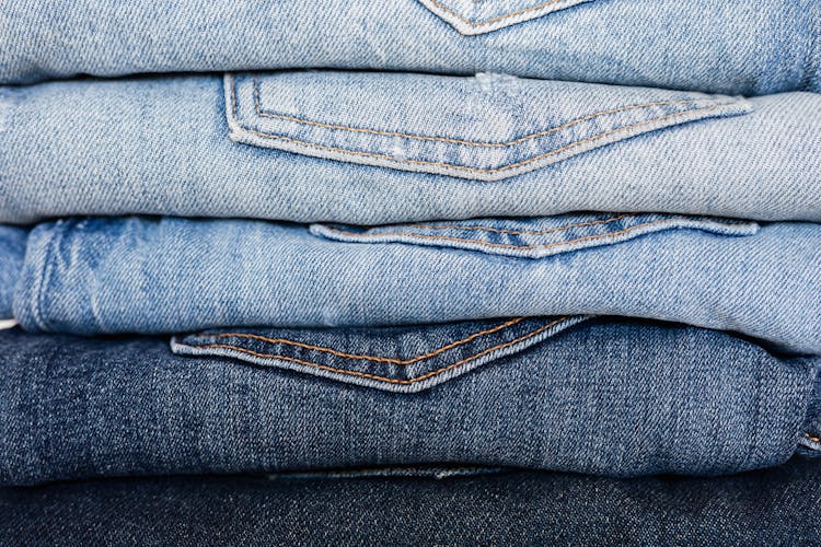 Stack Of Neatly Arranged Blue Jeans