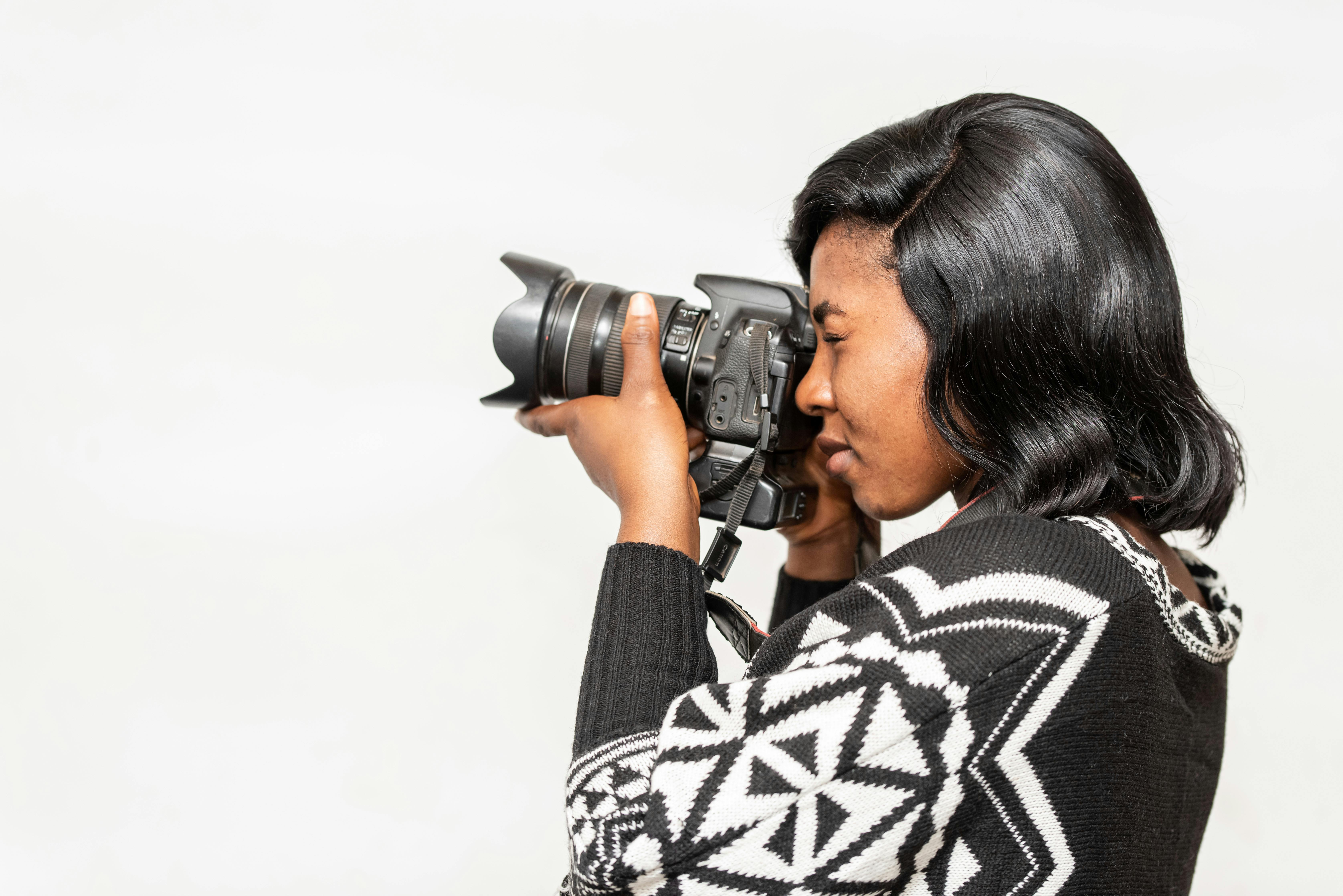 black photographer with camera