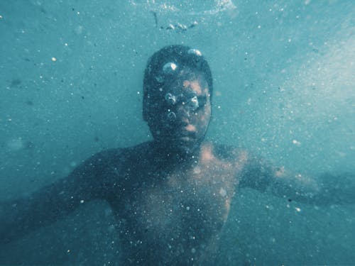 Free Photo of Man Swimming Underwater Stock Photo