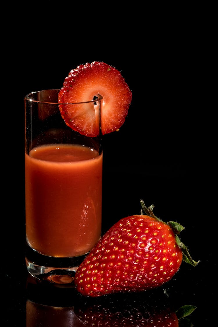 Strawberry Smoothie On Clear Drinking Glass