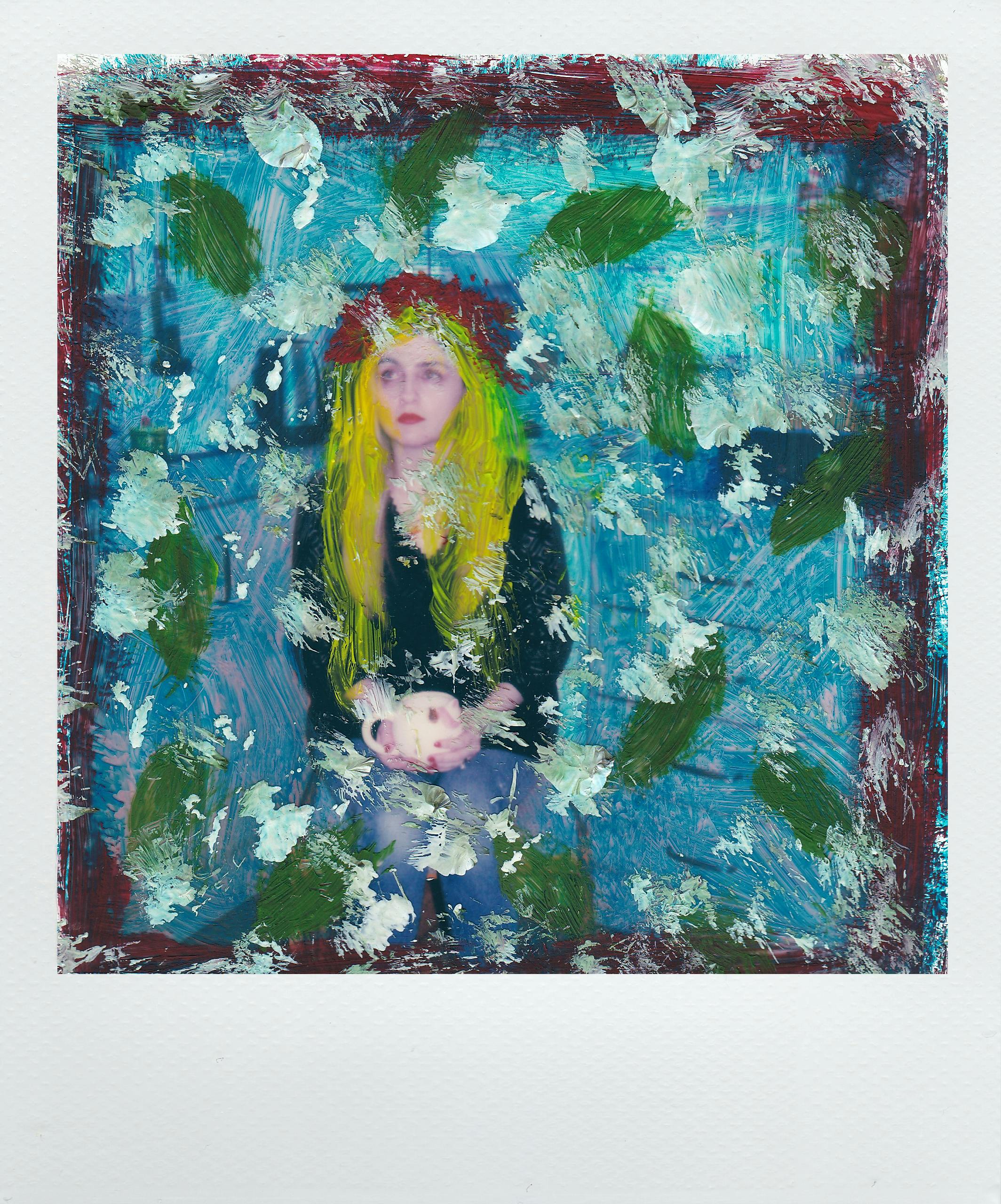 Abstract art featuring a woman's portrait intertwined with nature in vibrant colors.