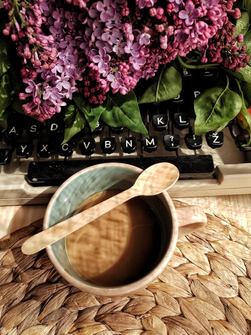 Free Wooden Spoon on Top of Ceramic Cup  Stock Photo