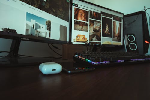 Free stock photo of airpods, computer, desk