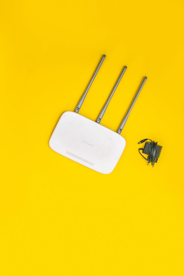 Wifi Router On Yellow Background