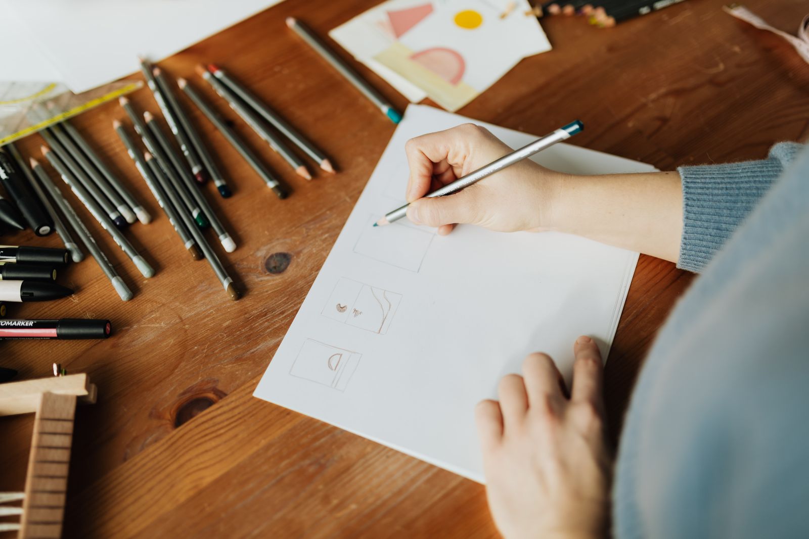 Hand-drawn pattern sketch on a work table