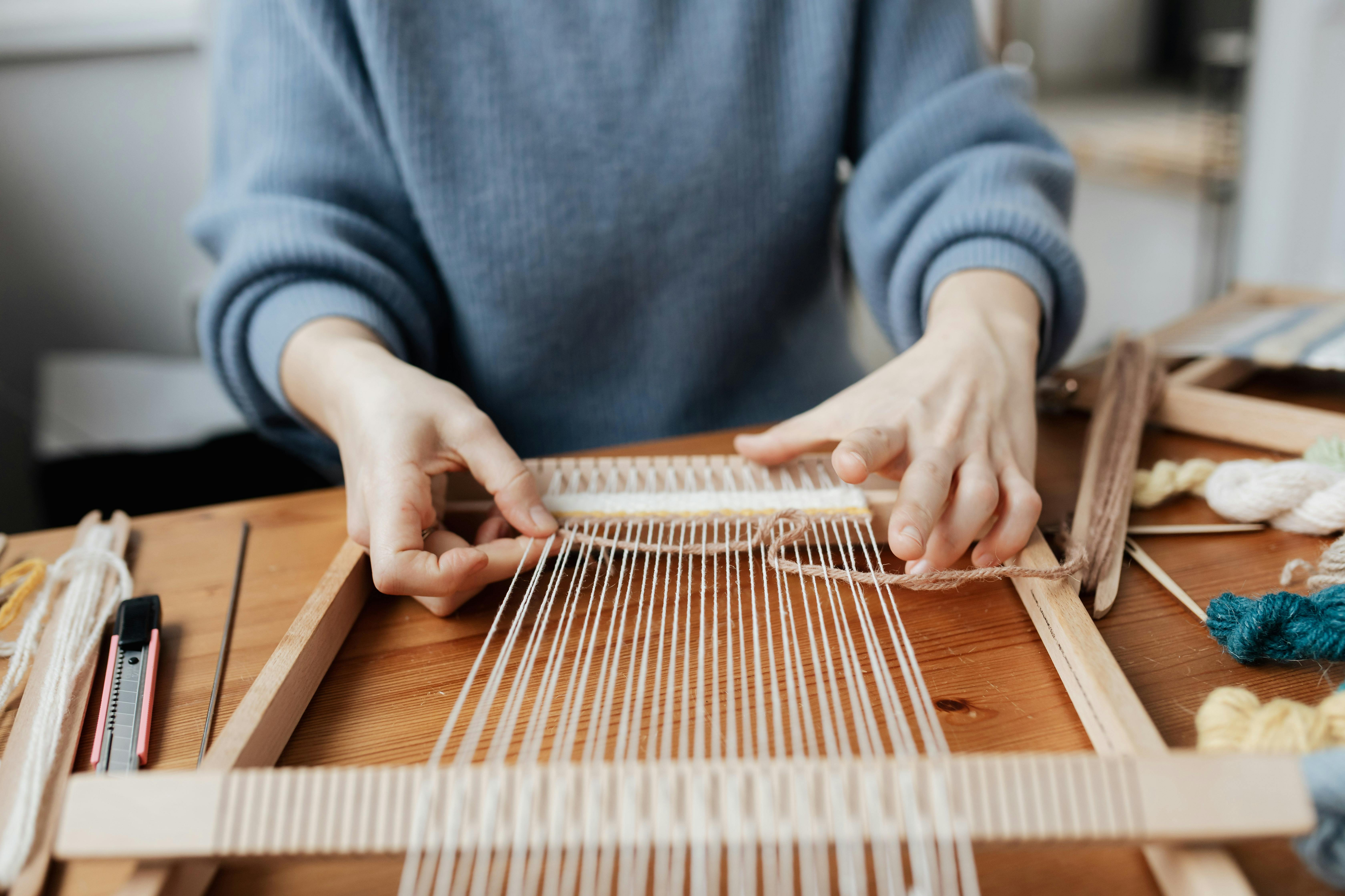 Person Weaving Using Hand Loom Free Stock Photo   Pexels Photo 4219650 