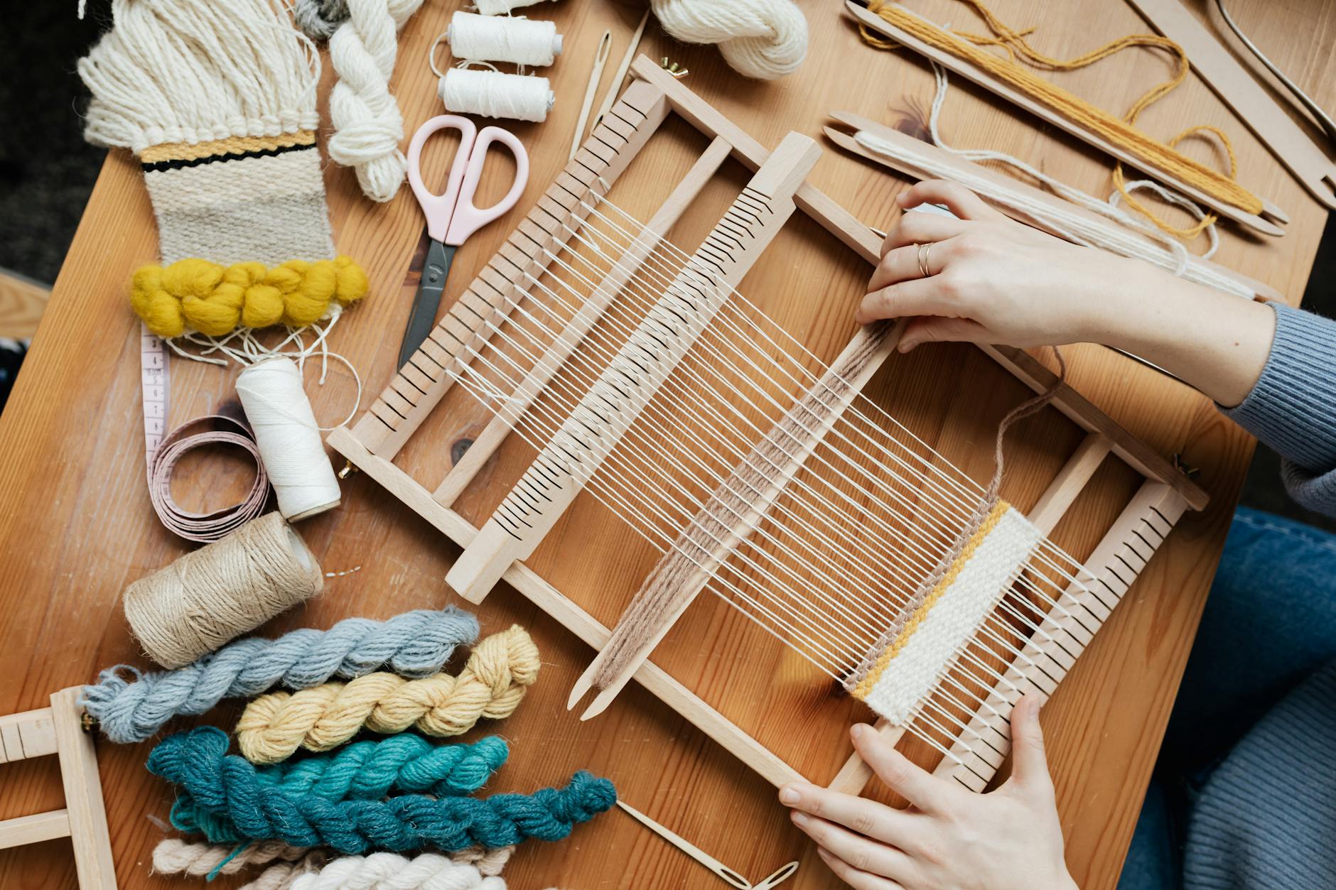 Top view image of a person weaving
