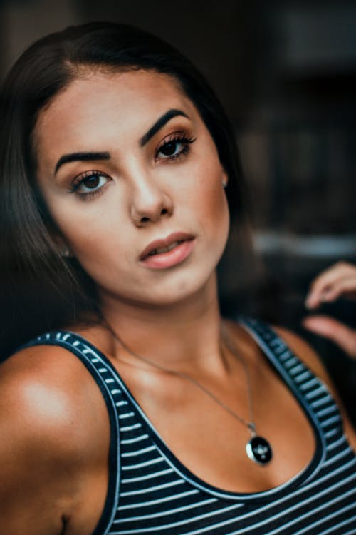 Woman in Striped Tank Top