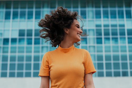 Woman in Orange Crew Neck T-shirt