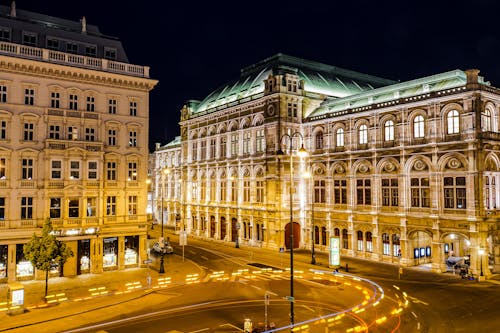 Free Illuminated State Opera in Vienna at Night Stock Photo
