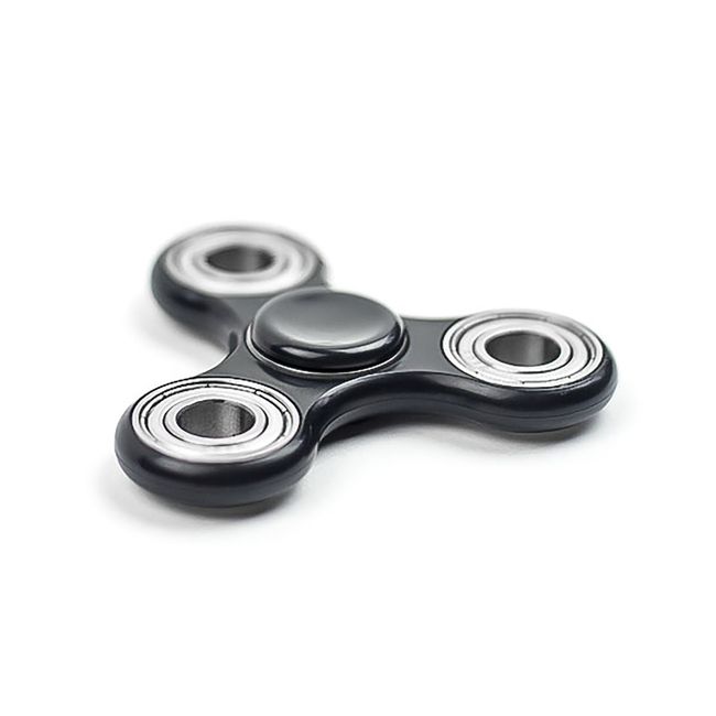 A sleek black fidget spinner with metal bearings posed on a clean white background.