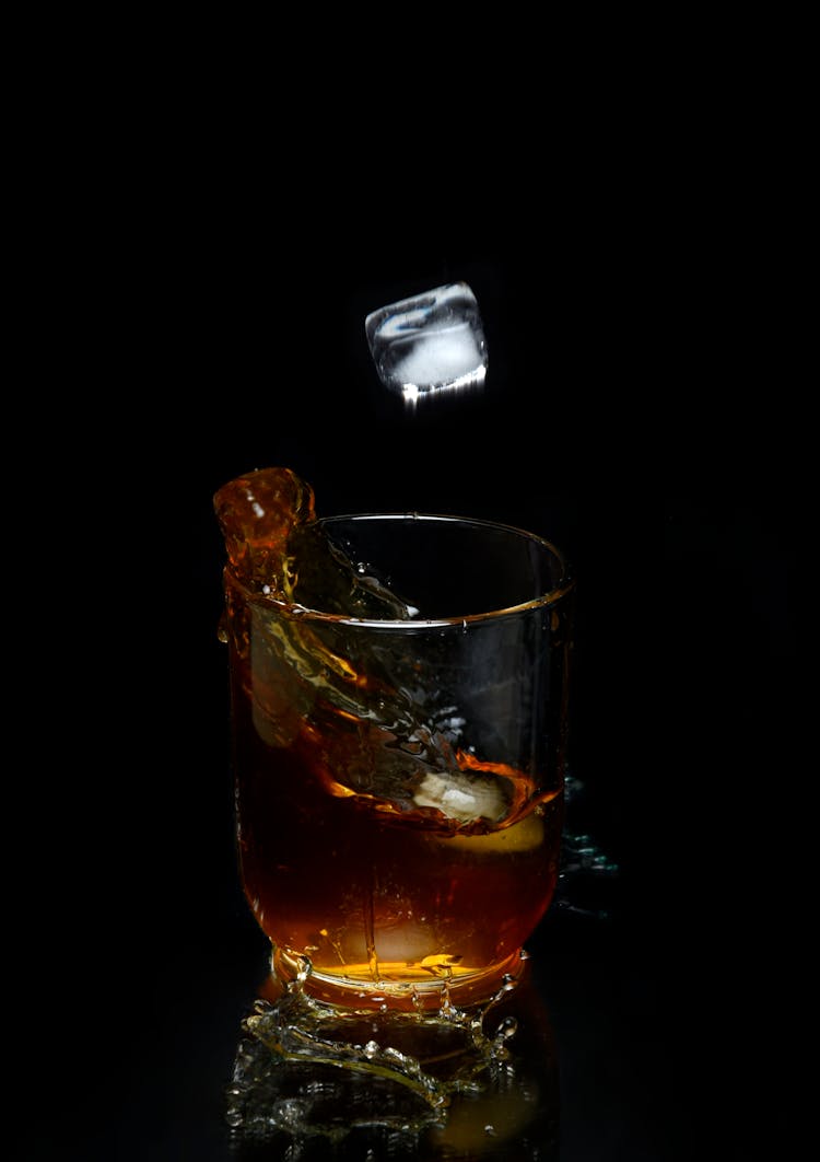 Falling Ice Cube On A Drink 