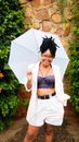 Woman in White Dress Holding Umbrella