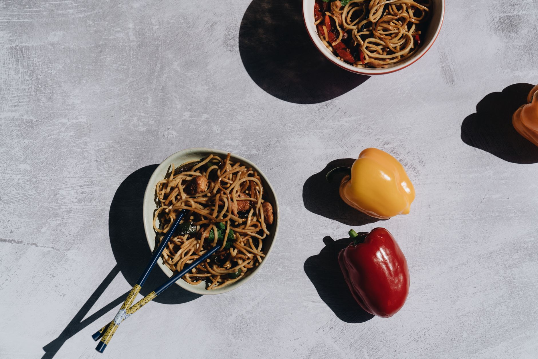 Fresh herbs and chopped peanuts topping chilled peanut noodles