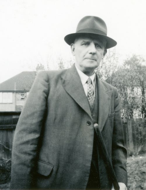 Portrait of Man in Suit and Hat