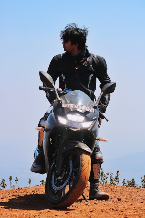 Free stock photo of bike rider, green mountains, india Stock Photo