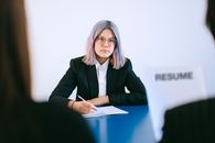 Woman in Black Blazer Wearing Eyeglasses