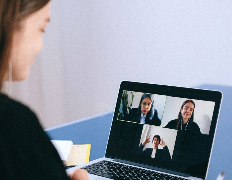 People on a video call with a remote team