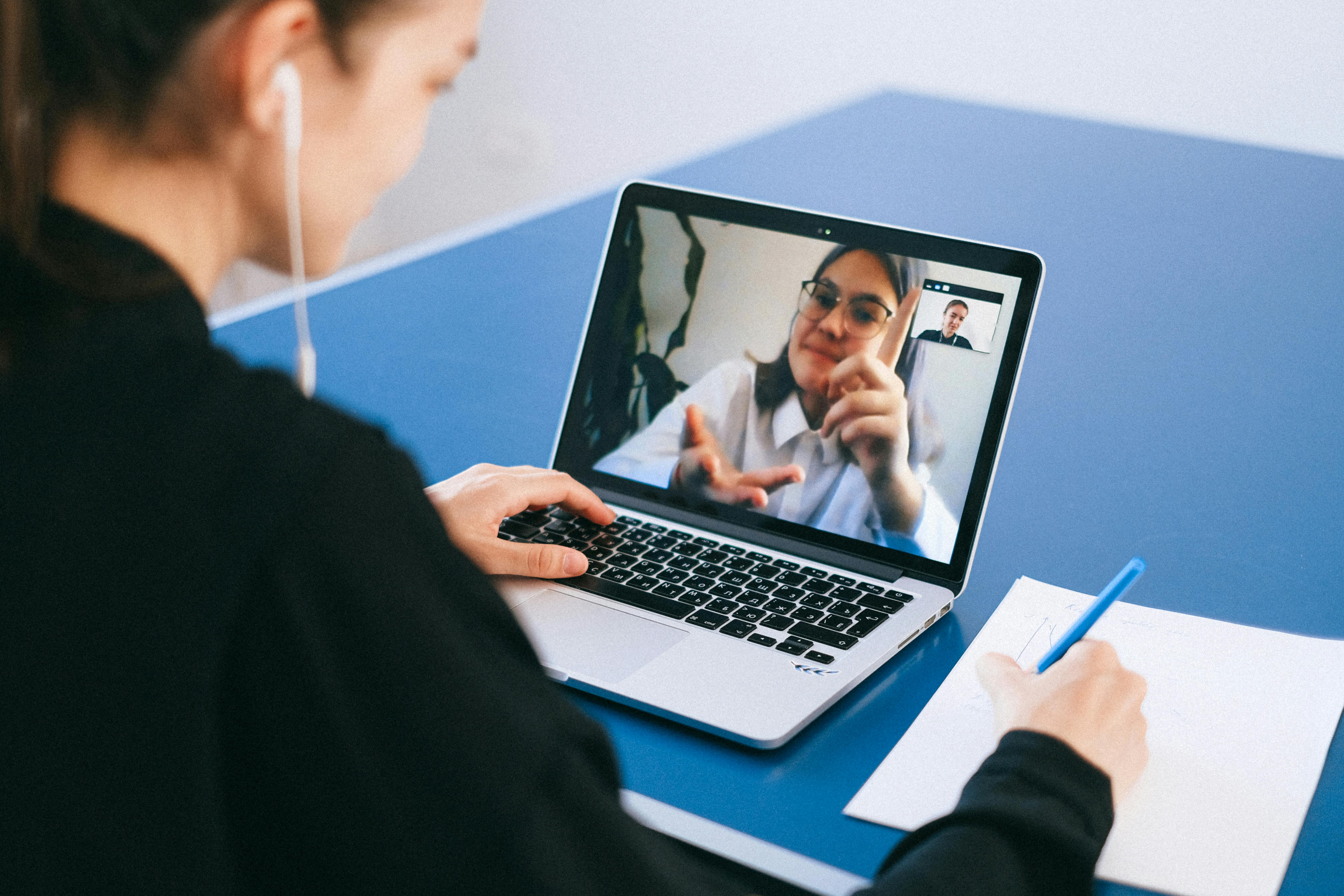 two people on skype stock image