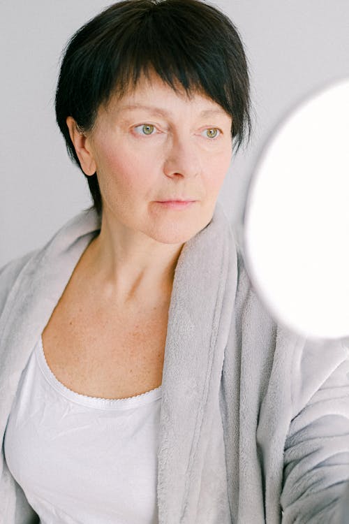 Free Close-Up Shot of a Woman with Short Hair Stock Photo