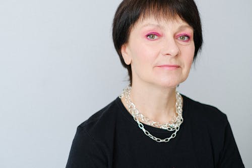 Close-up Shot of an Elderly Woman with Makeup