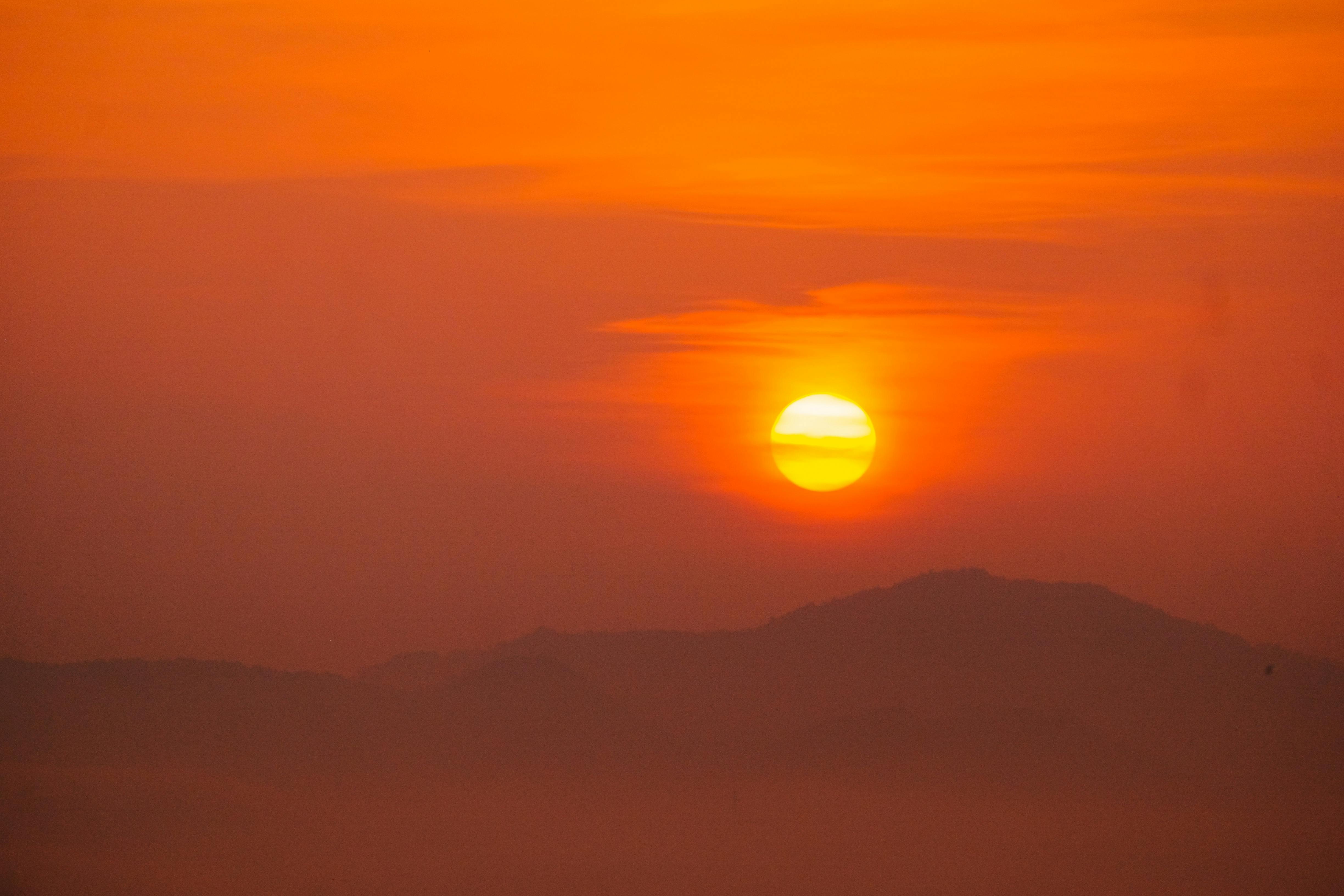 Photography of Hand During Sunset · Free Stock Photo