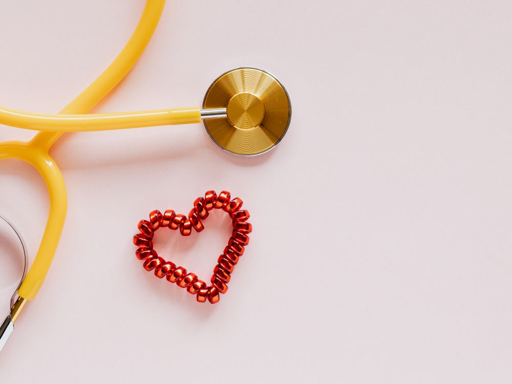 Stethoscope near a small red heart