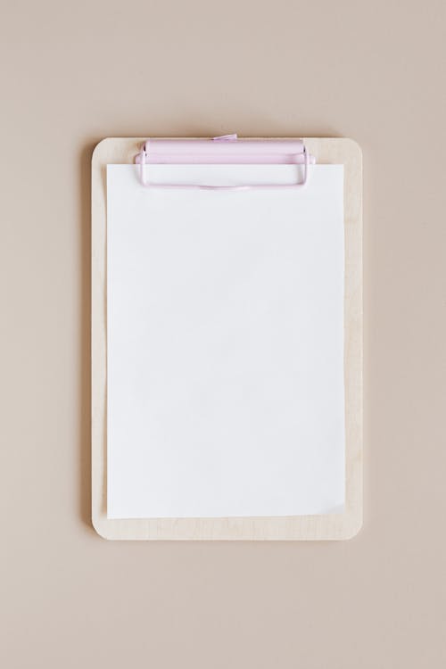 Mockup of White Clipboard with Blank Paper