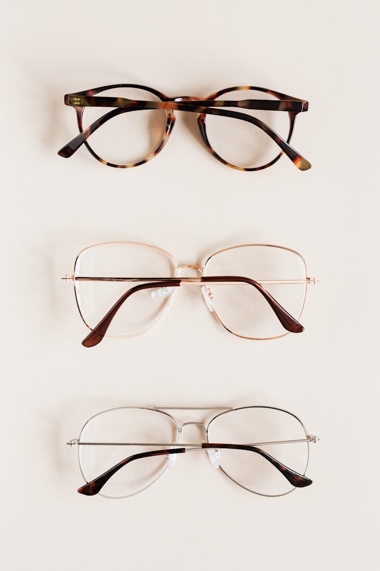 Modern Different Glasses On Beige Background