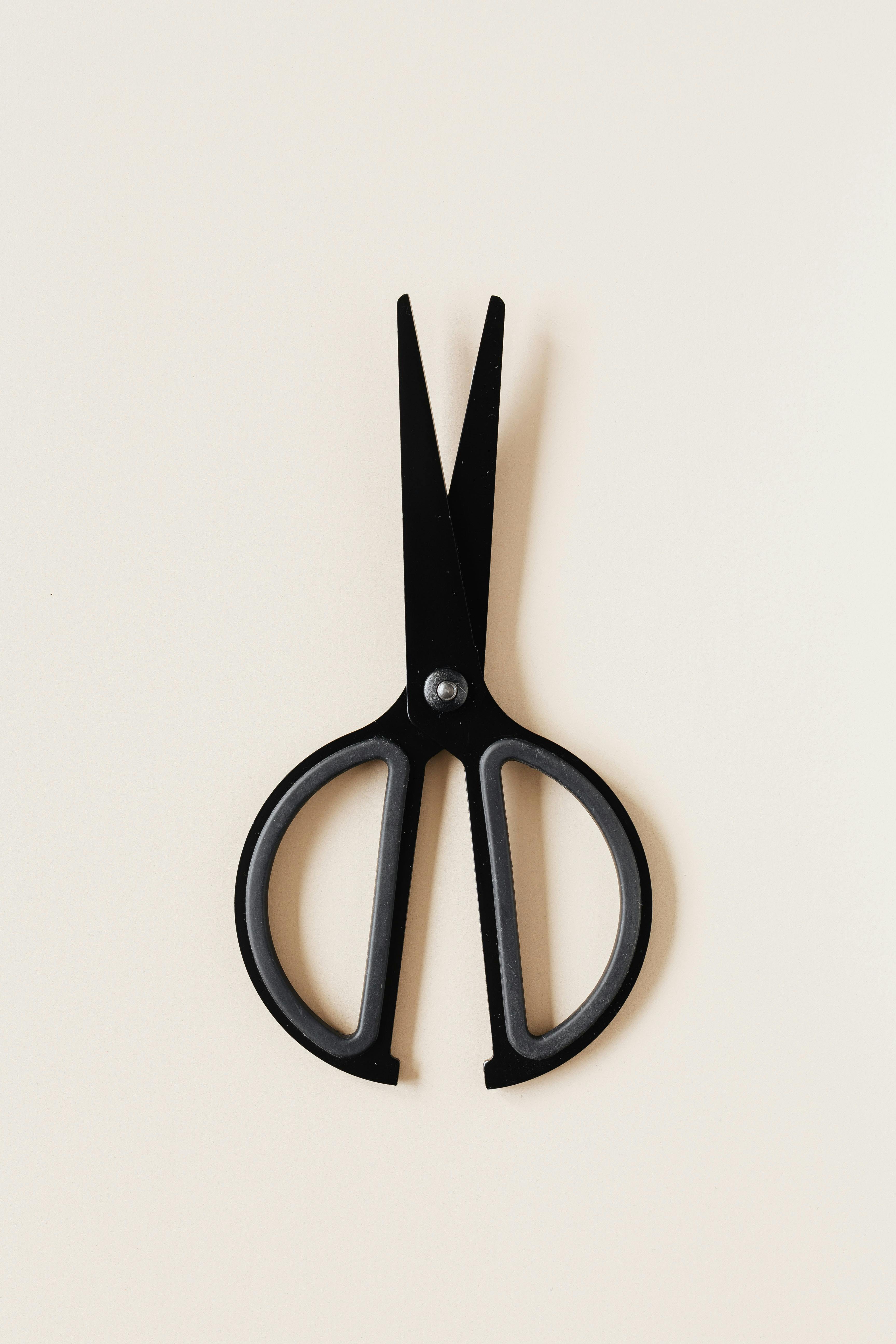 Black Knitting Scissors Isolated On White Background Stock Photo, Picture  and Royalty Free Image. Image 79855632.