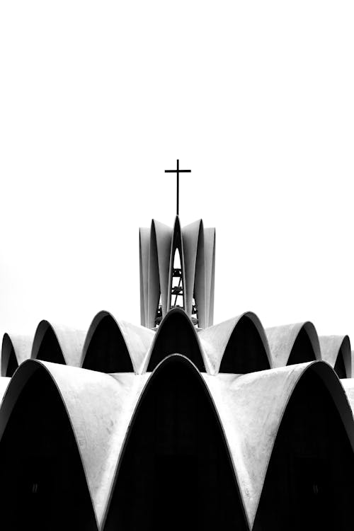 Monochrome Shot of a Cross on Top of a Church