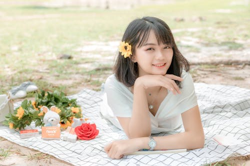 Tender woman with flower in park · Free Stock Photo