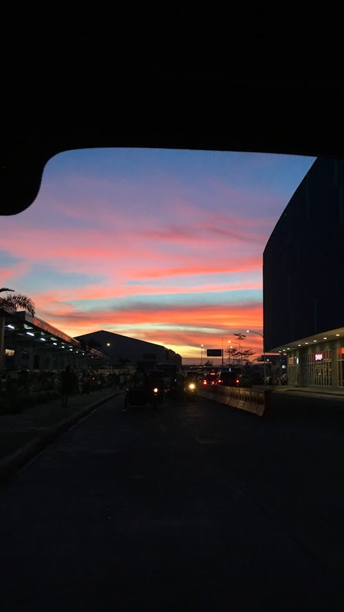 Free stock photo of beautiful sunset, city lights, city traffic Stock Photo