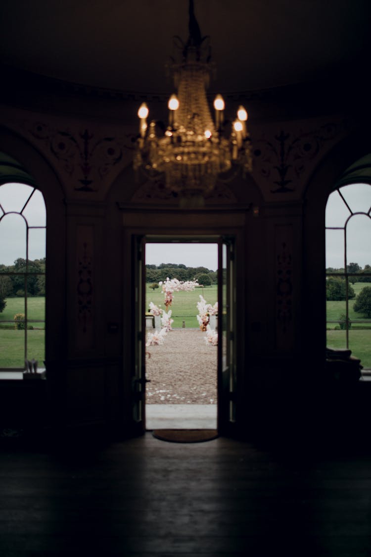 Wedding Arch Through Open Door