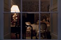 Living room with holiday table through window